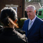 Clive Grunshaw and officer
